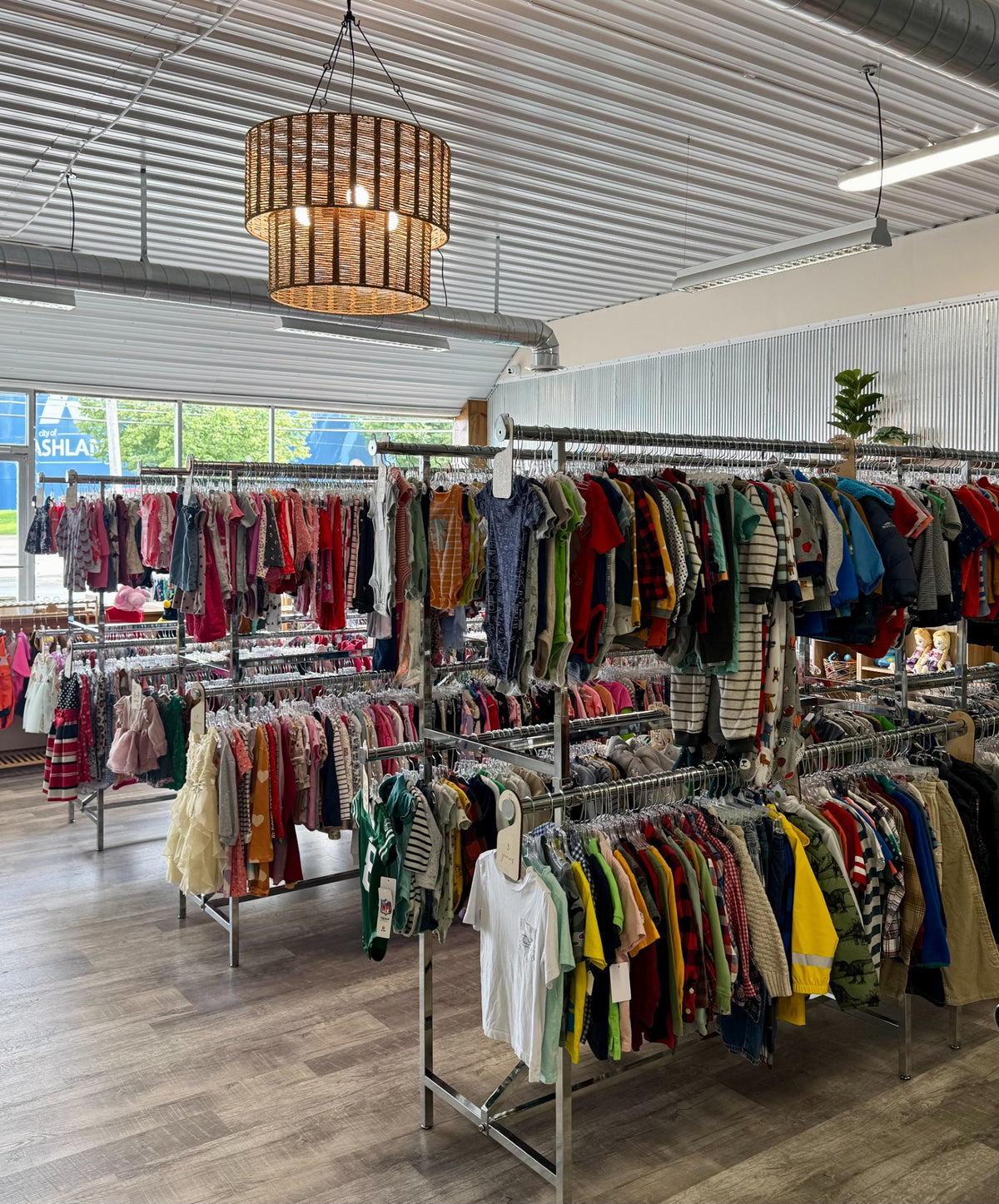 Clothing displays inside Clover Kids Resale Shop